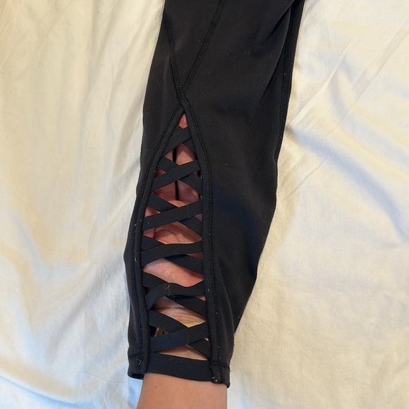 Black Lululemon Athletica High Rise Criss Cross Ankle Leggings - Picture 5 of 8
